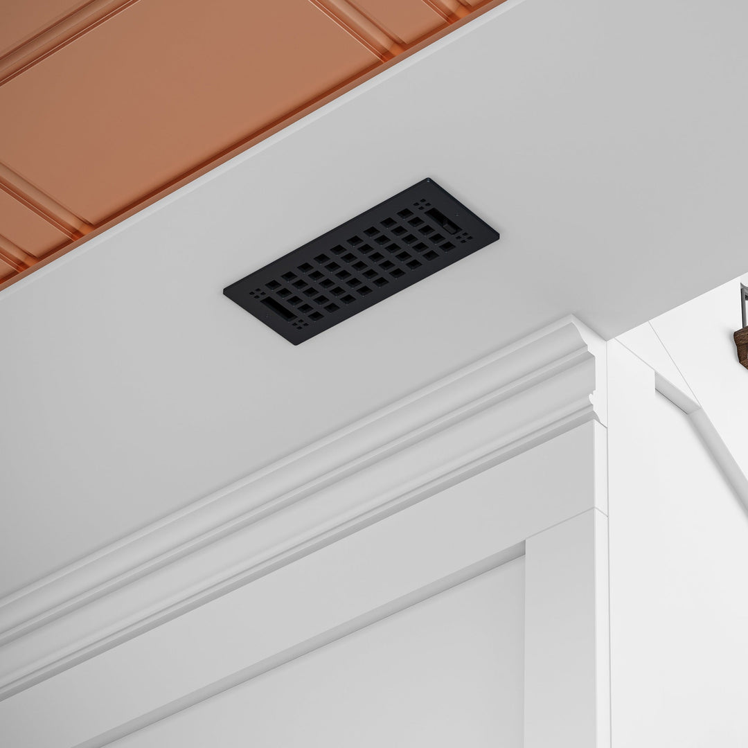 Premium artisan steel vent cover in the ceiling of a white room.